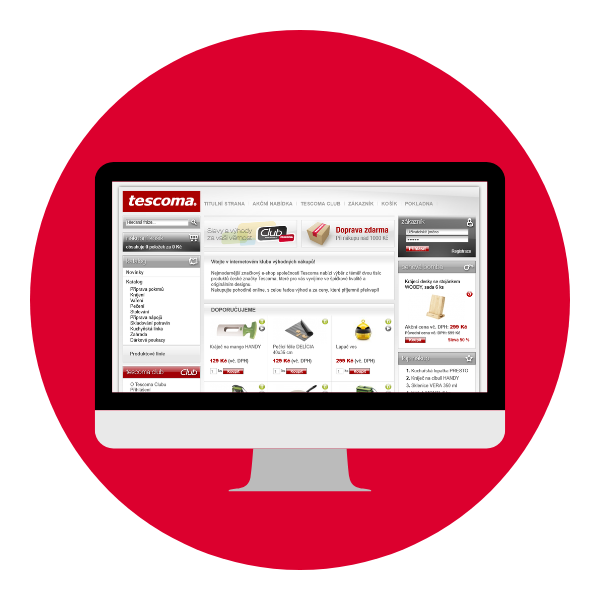 Opis: grafika przedstawia monitor komputera, na którym wyświetla się strona główna Tescomy. Monitor stoi na czerwonymtle.